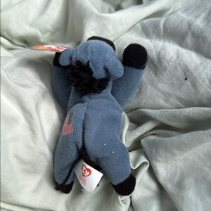 Blue and Black Plush Toy